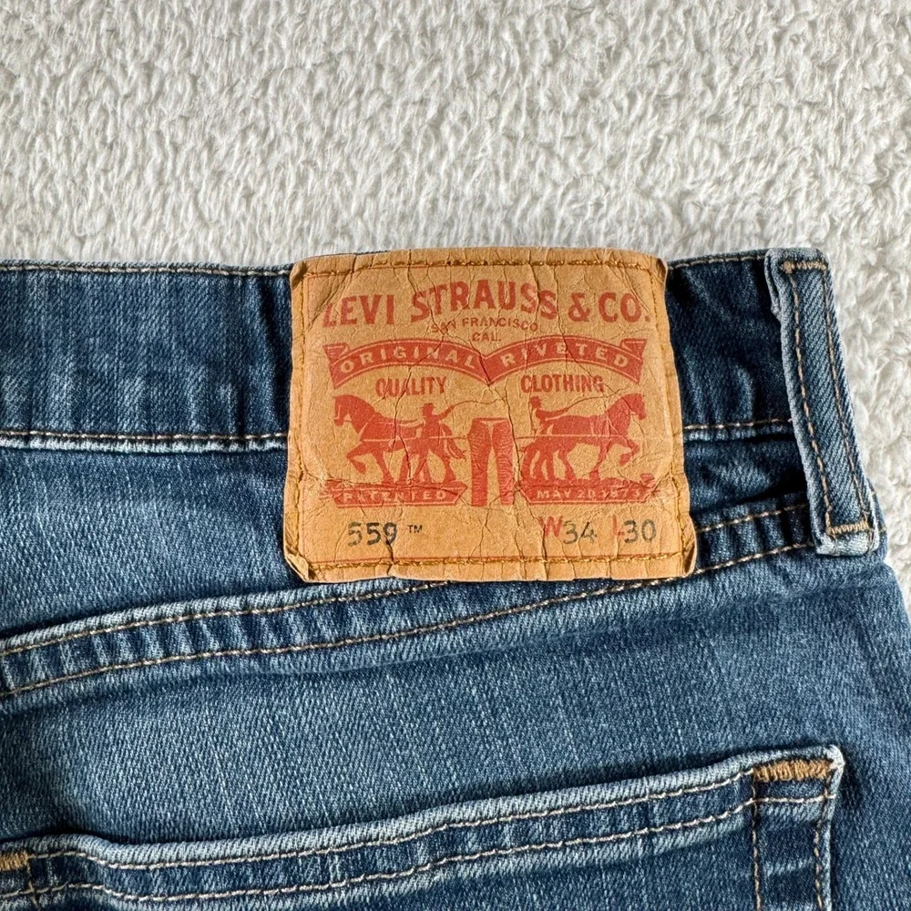 Levi's 559 Denim Relaxed Straight Jeans Pants Men's Size 34x30 Medium Wash Clean